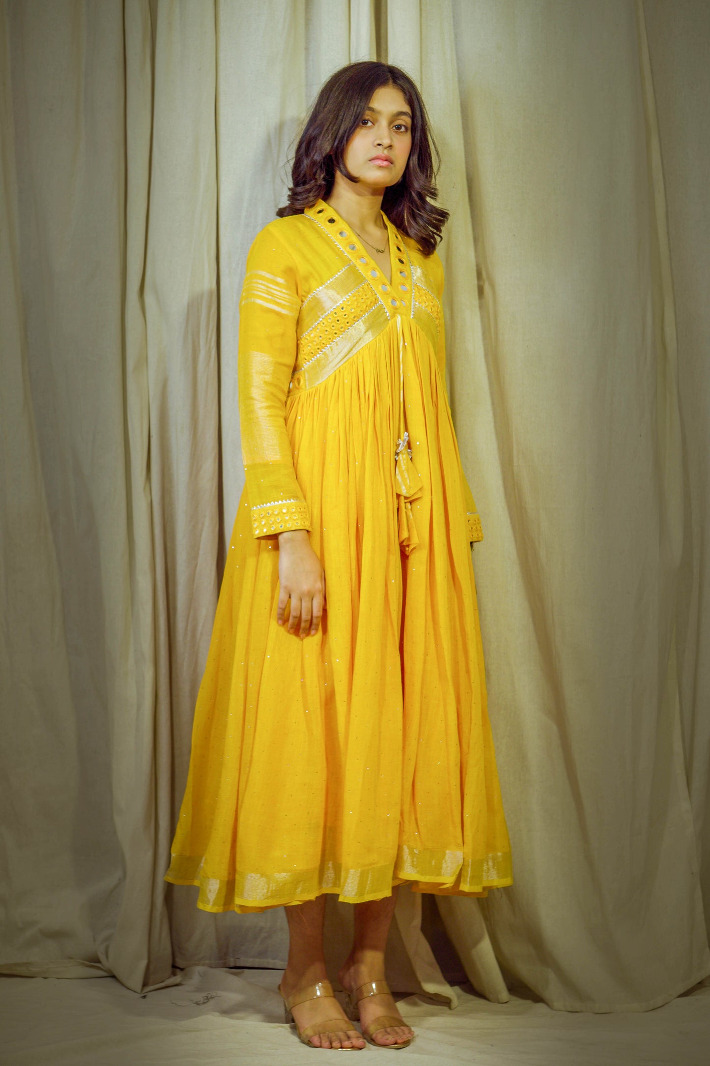 Saanjh – Yellowish Orange Pure Linen Flared Dress with Mirror & Mukesh Work