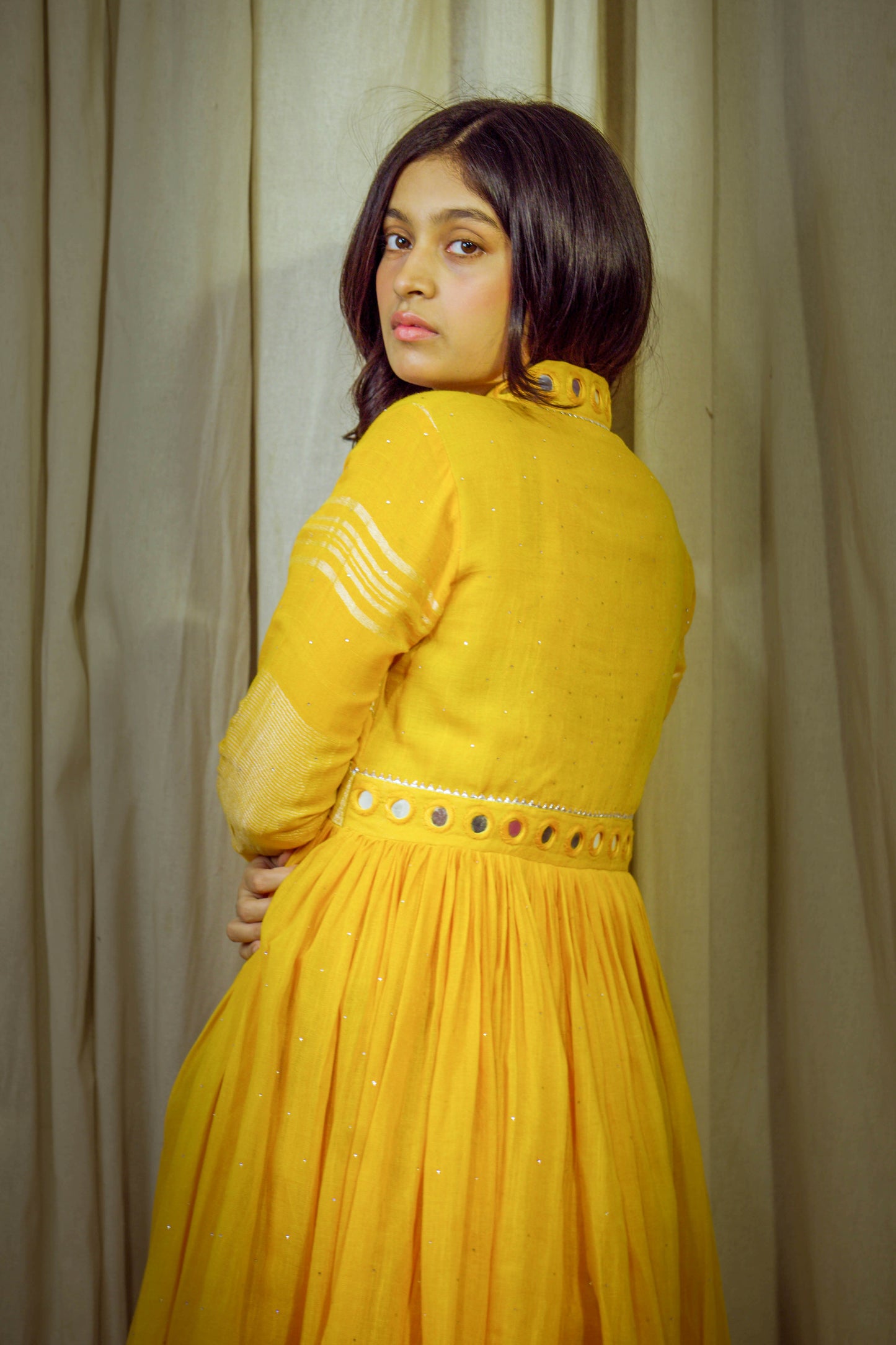 Saanjh – Yellowish Orange Pure Linen Flared Dress with Mirror & Mukesh Work
